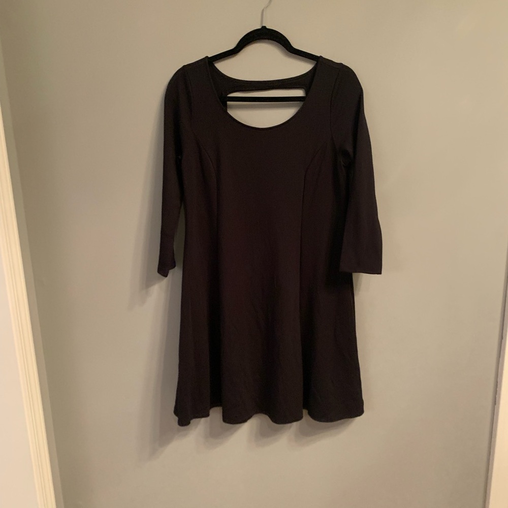 Black dress with a scoop neck back. In great condition